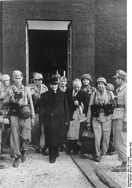 Benito Mussolini leaves the hotel after being freed from captivity, 1943