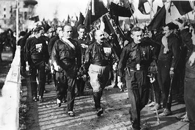 Benito Mussolini (2nd from left) and his Fascist Blackshirts in 1920