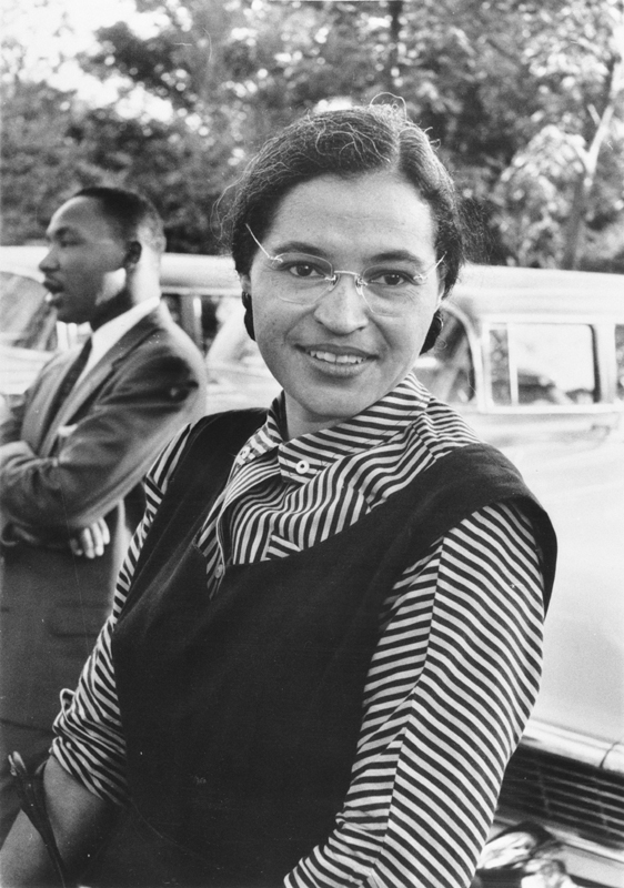 Rosa Parks with Martin Luther King in the background